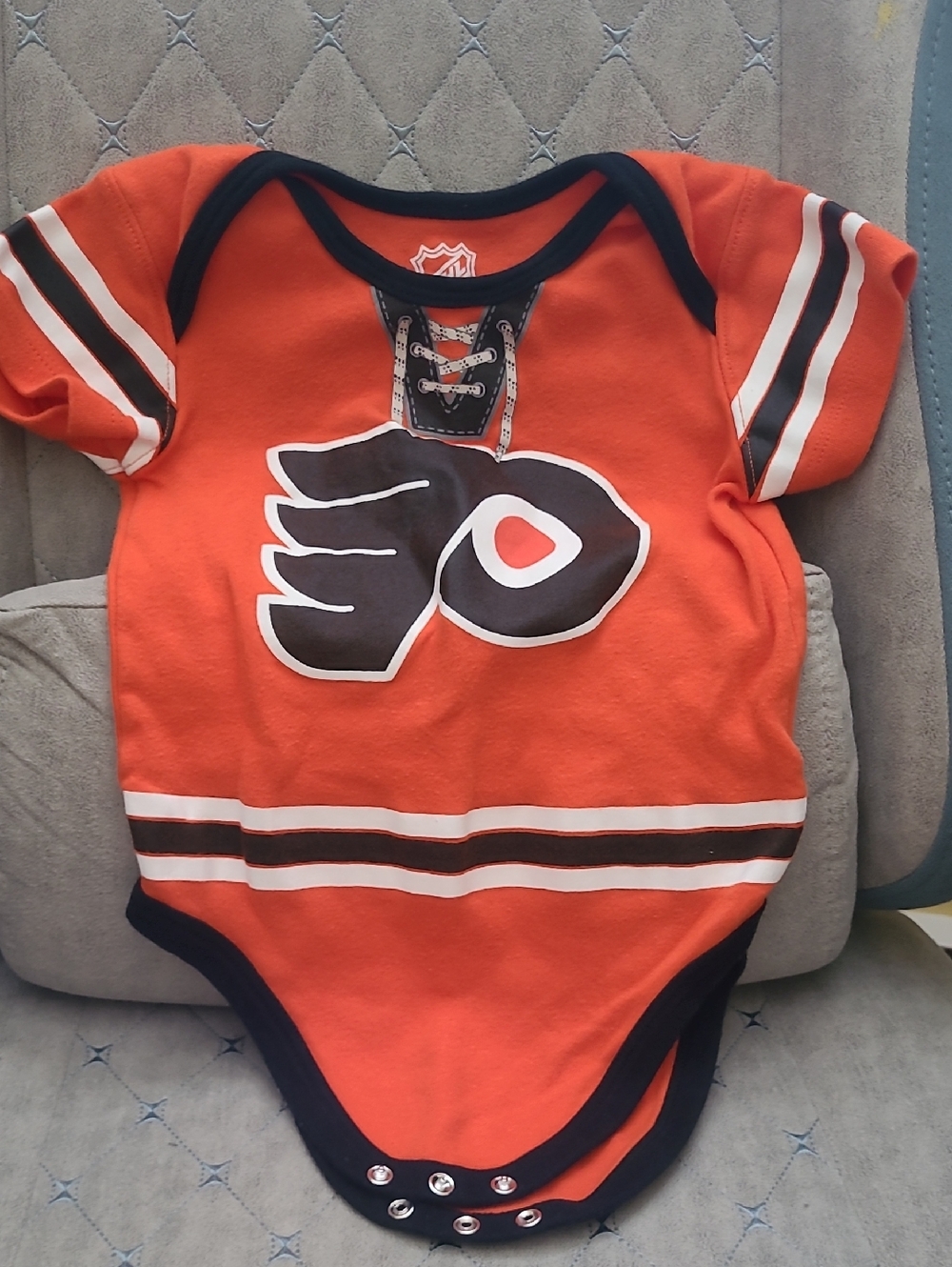 NHL Flyers 24m Orange and Black Baby One-Piece Bodysuit with Team Logo